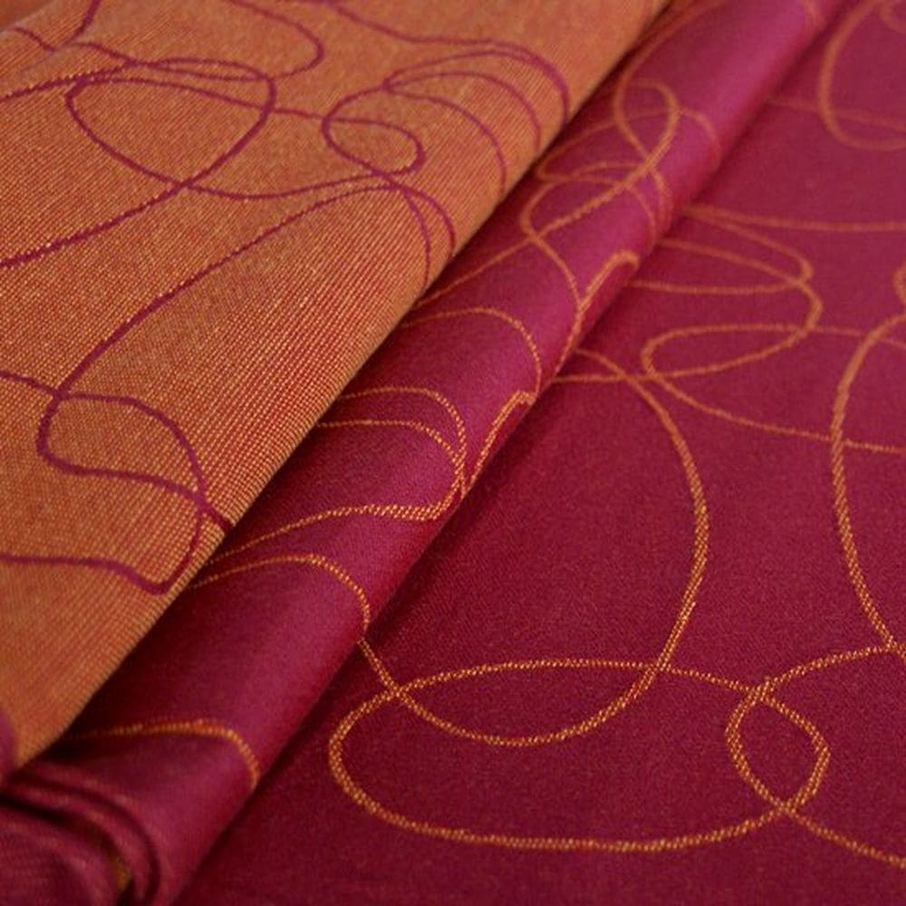 Didymos Babytragetuch Ellipsen rubin-mandarine